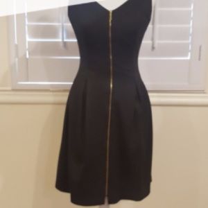 Size 8 RMLL dress with front gold zipper detail.